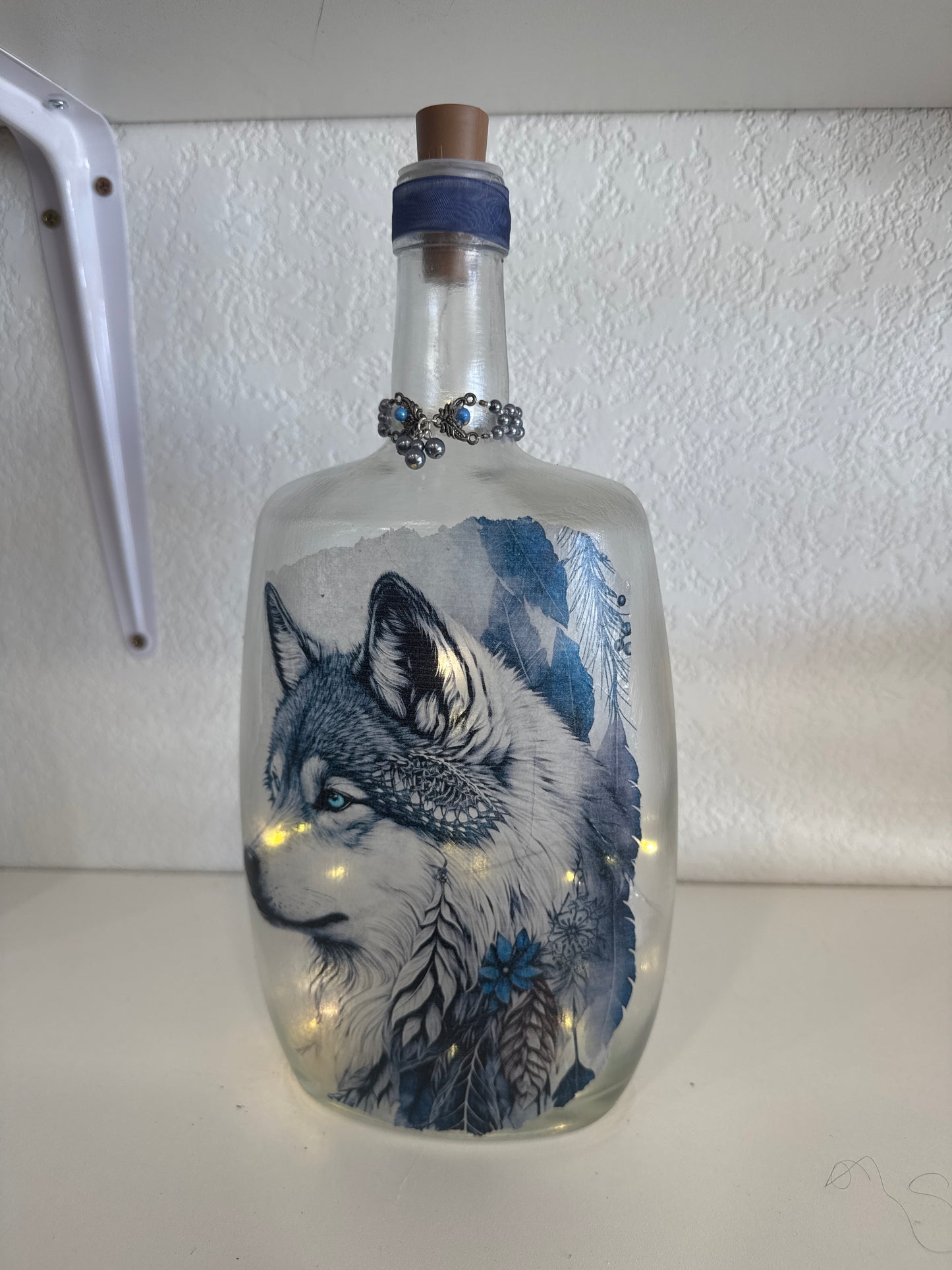 lg lighted wolf bottle